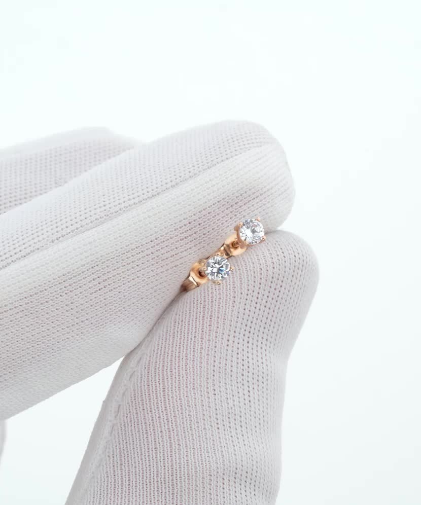 Gold earrings with zircons