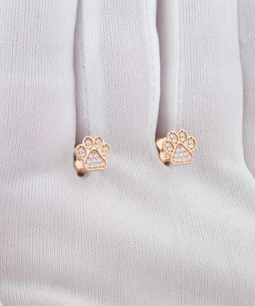 Kultaiset korvakorut zirkoneilla