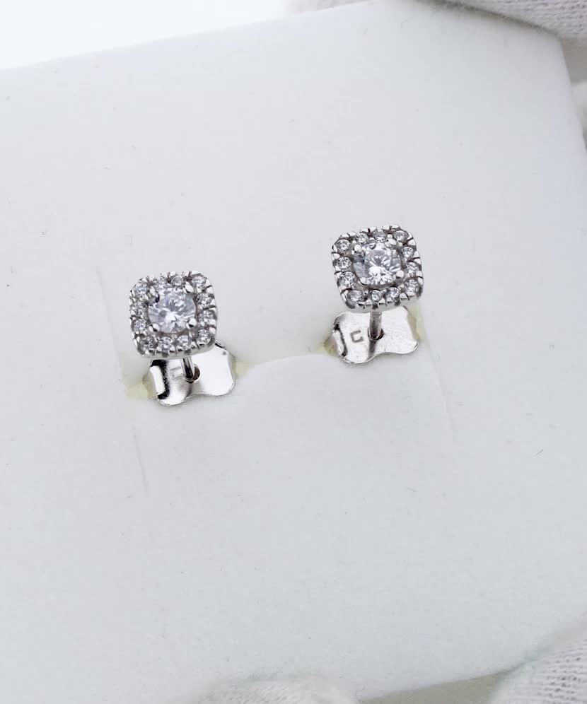White gold earrings with zircons