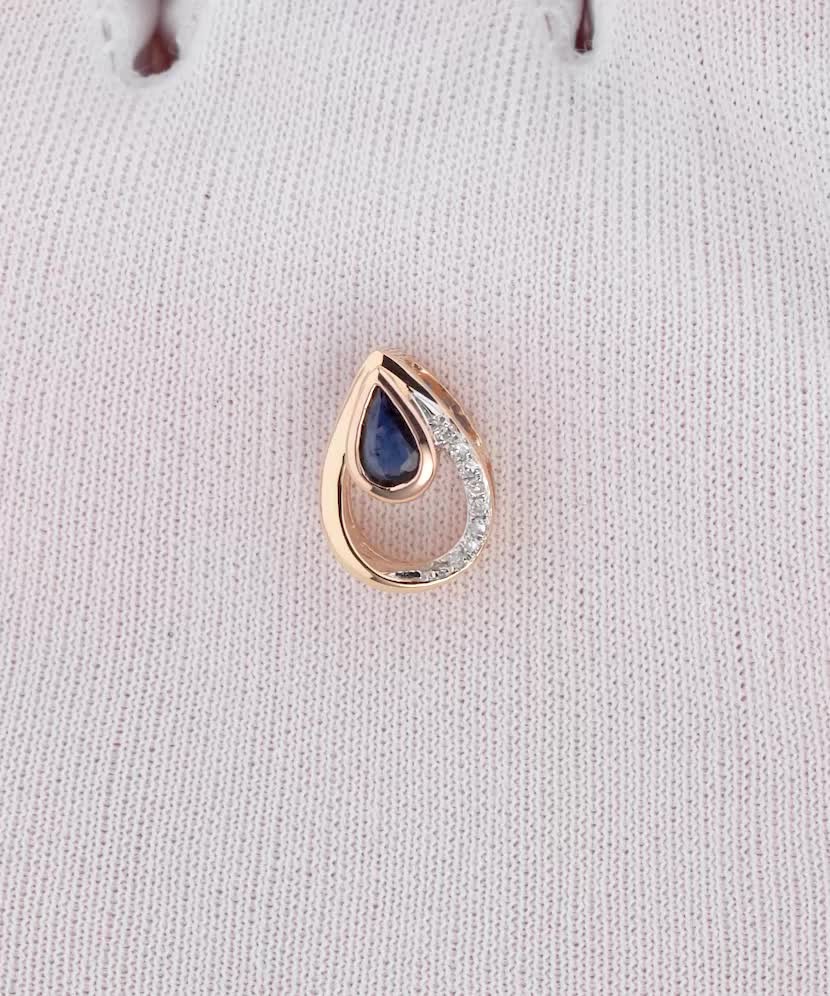 Gold pendant with sapphire and diamonds