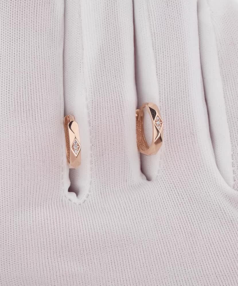 Gold earrings with zircons