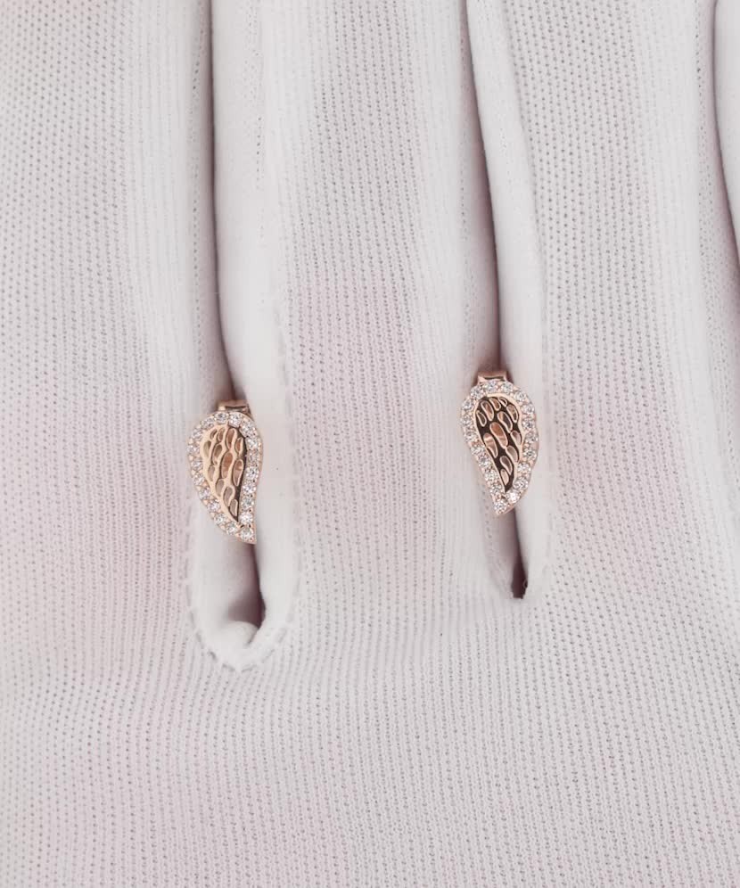 Gold earrings with zircons