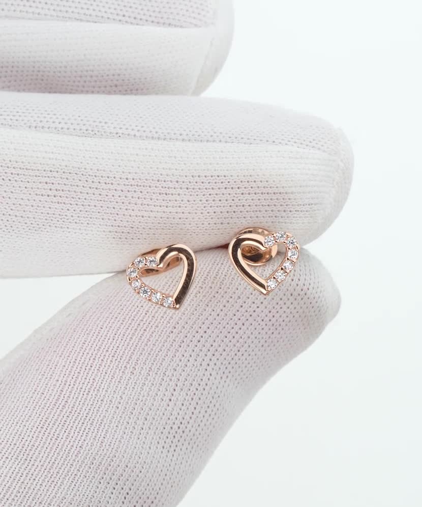 Kultaiset korvakorut zirkoneilla "Sydäns"