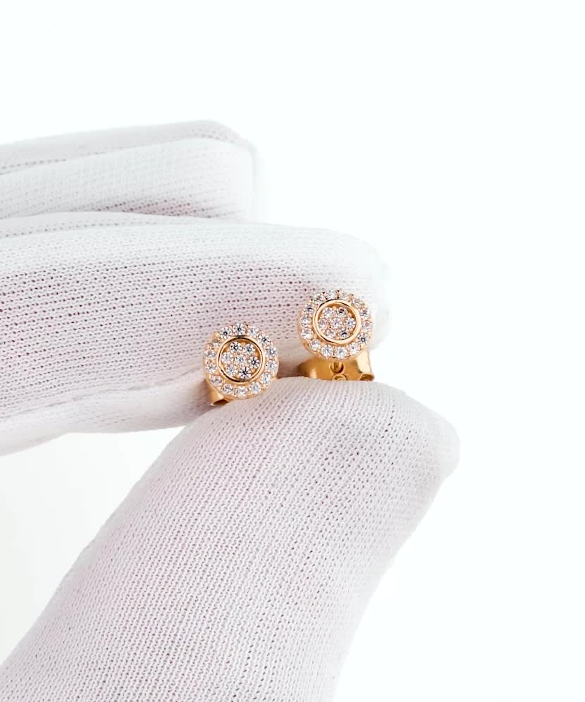 Kultaiset korvakorut zirkoneilla