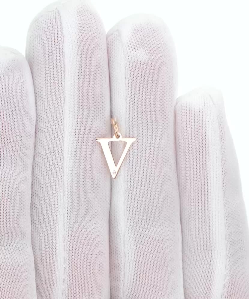 Gold pendant with diamond letter V