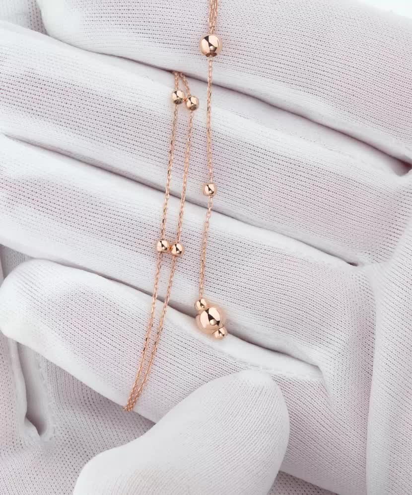 Gold chain with pendants