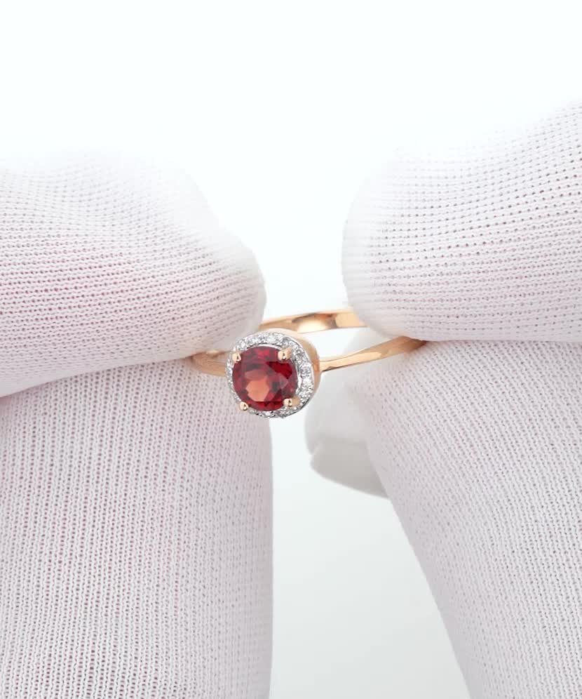 Gold ring with diamonds and garnet