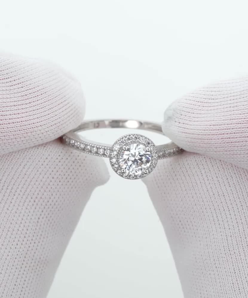 White gold ring with zircons