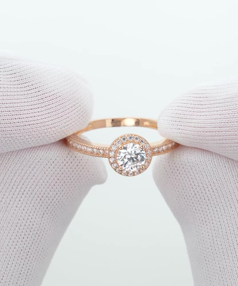 Gold ring with zircons