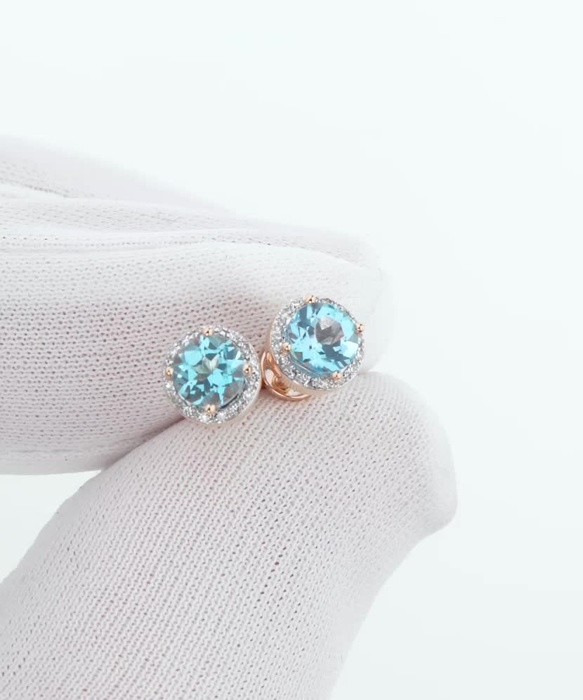 Gold earrings with diamonds and topazes