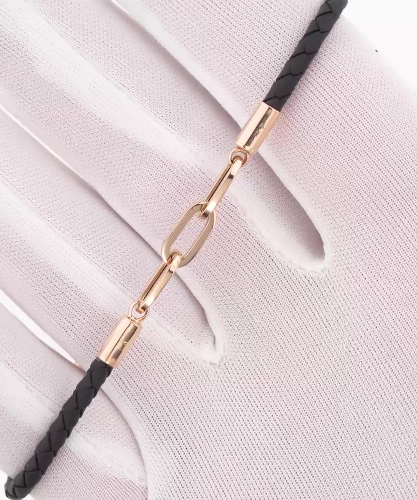 Leather bracelet with gold and zircons