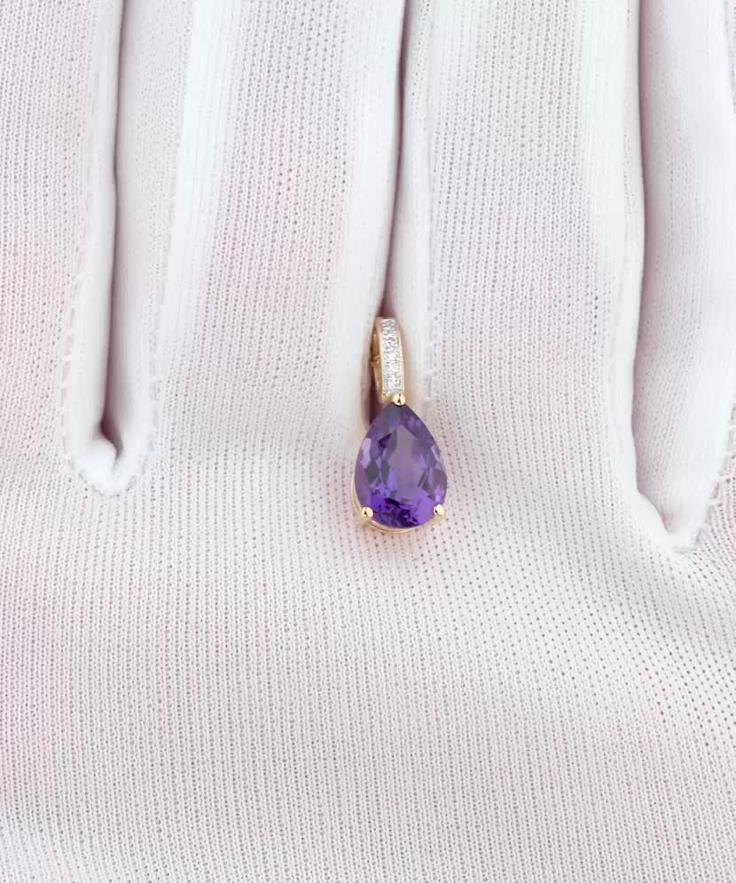 Yellow gold pendant with diamonds and amethyst