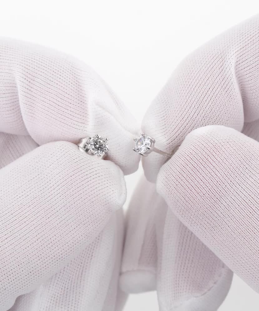 Valkokultaiset korvakorut zirkoneilla