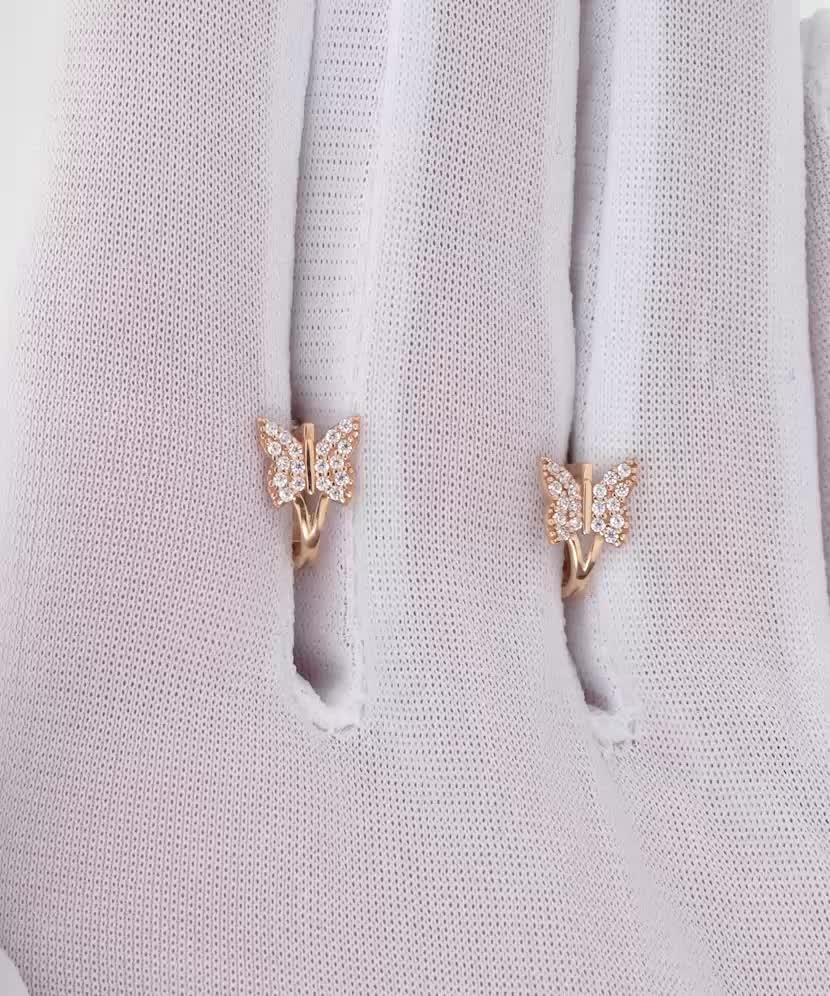 Kultaiset korvakorut zirkoneilla "Perhonen"