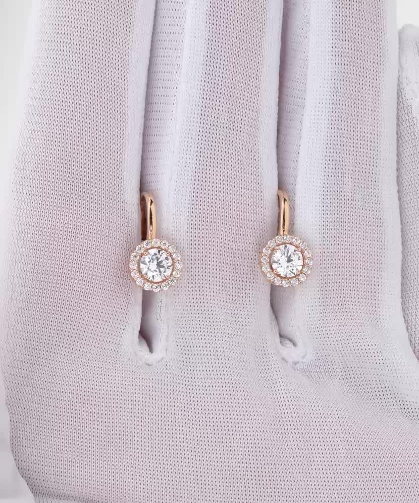 Gold earrings with zircons