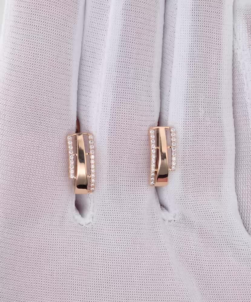 Gold earrings with zircons