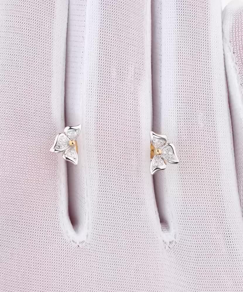 Kopio tuotteesta Keltaiset kultaiset korvakorut timanteilla