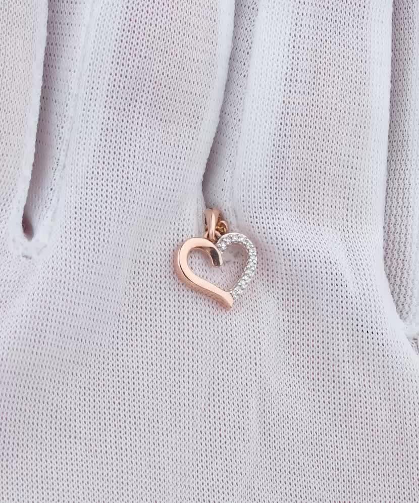 Kultainen riipus timanteilla "sydän"