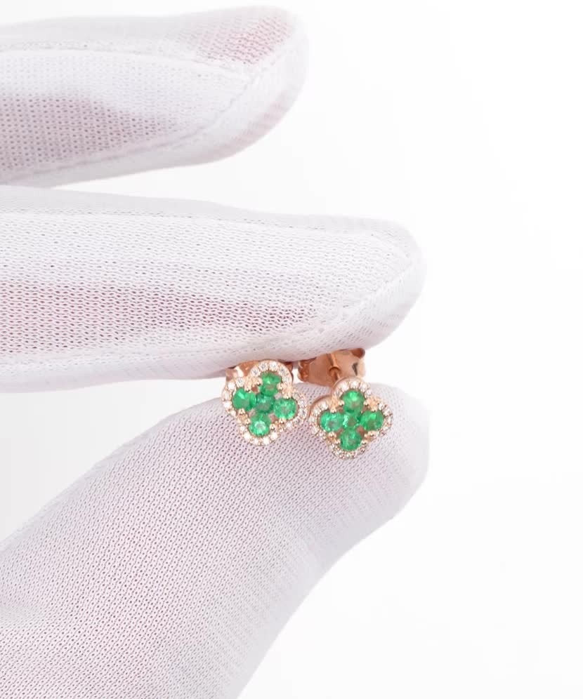 Gold earrings with emeralds and diamonds
