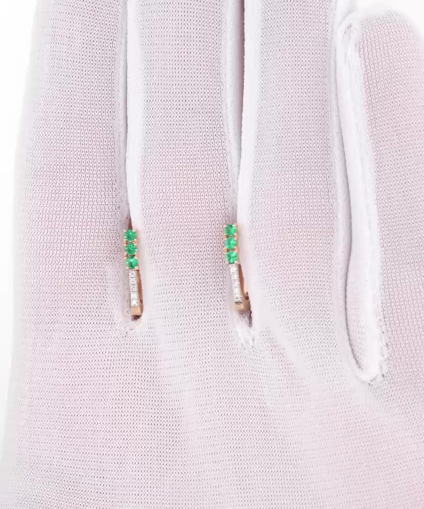 Gold earrings with emeralds and diamonds
