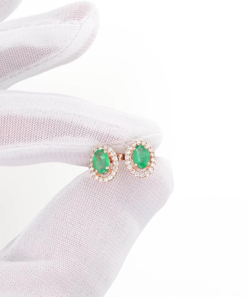 Gold earrings with emeralds and diamonds