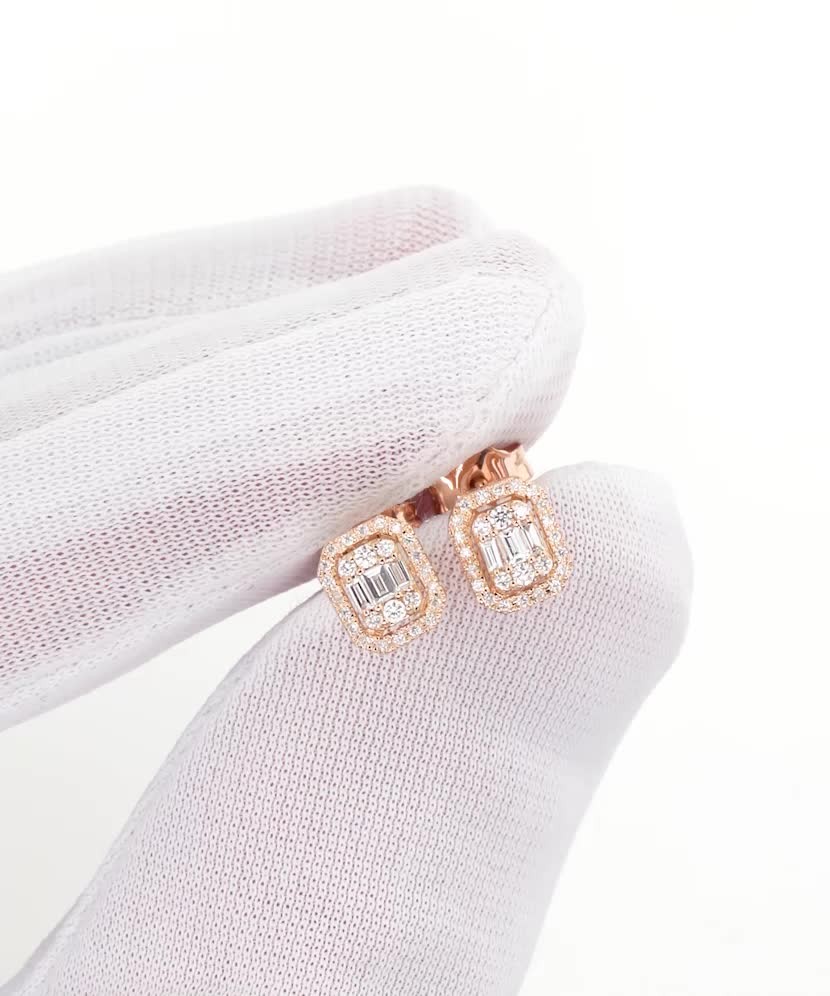 Kultaiset korvakorut timanteilla