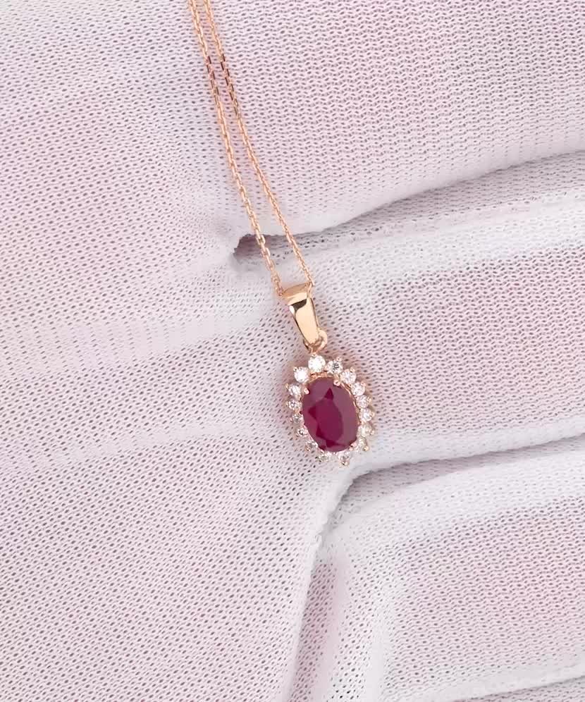 Gold chain with ruby and diamond pendant