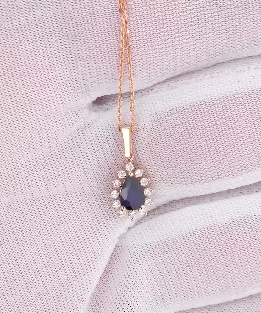 Gold chain with sapphire and diamond pendant