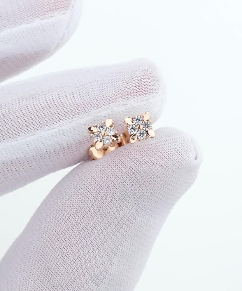 Gold earrings with zircons