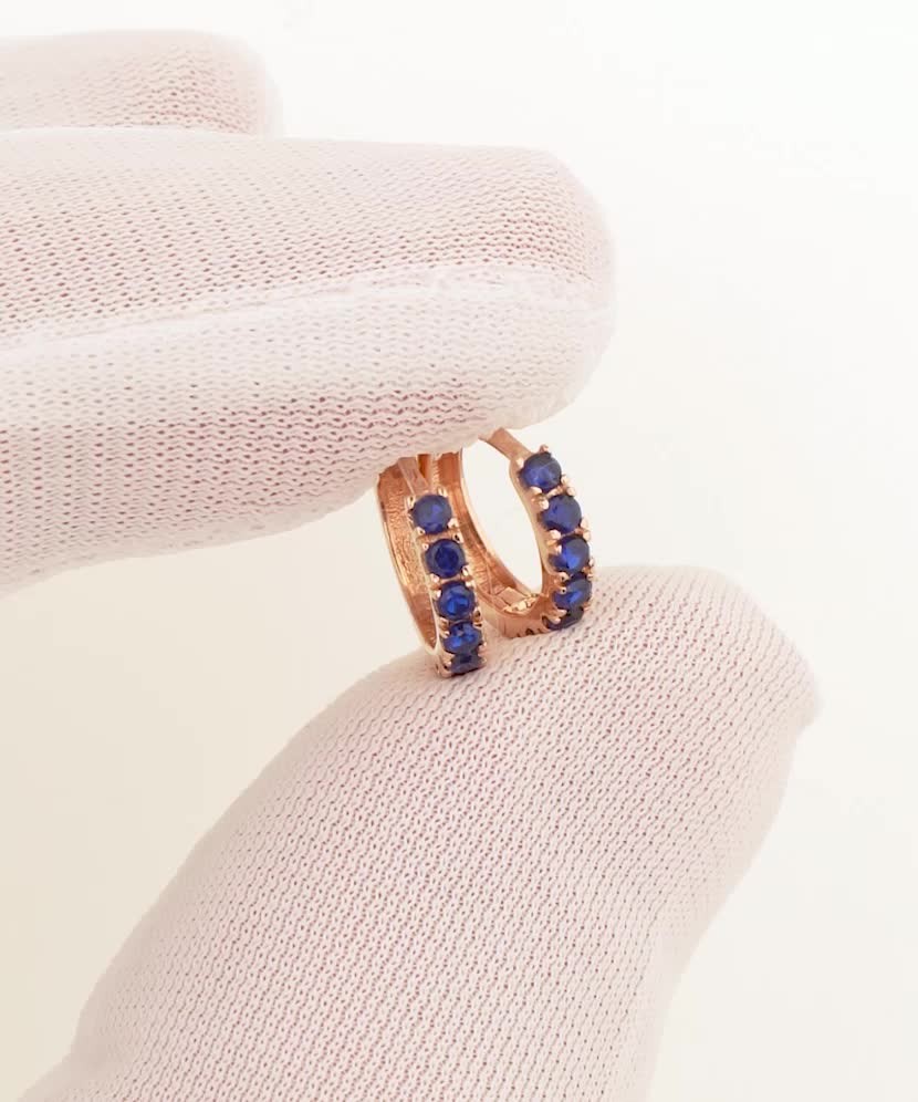 Gold children's earrings with zircons