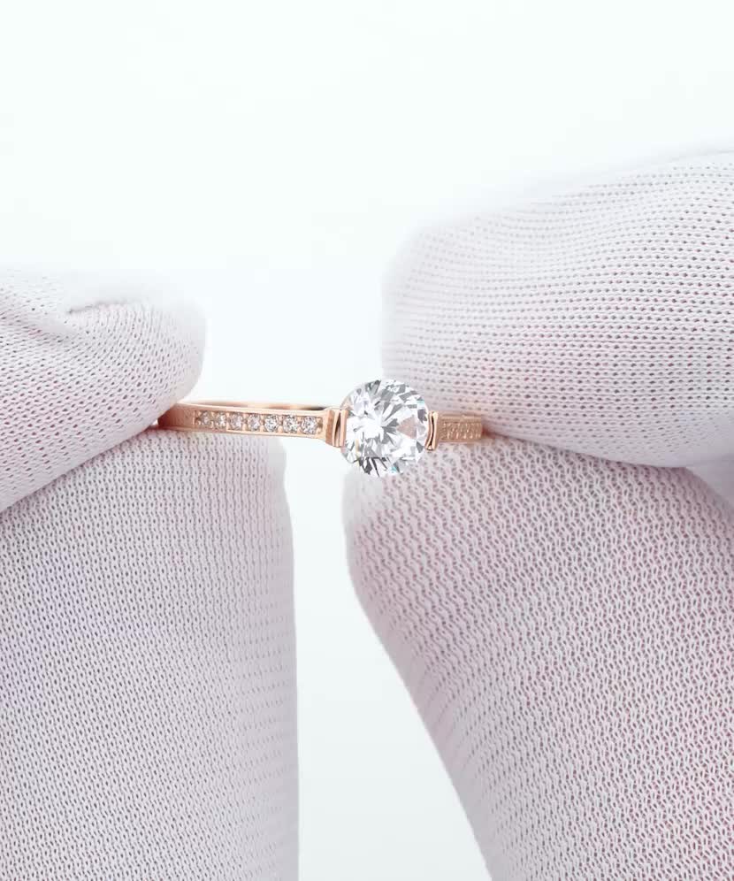 Gold ring with zircons