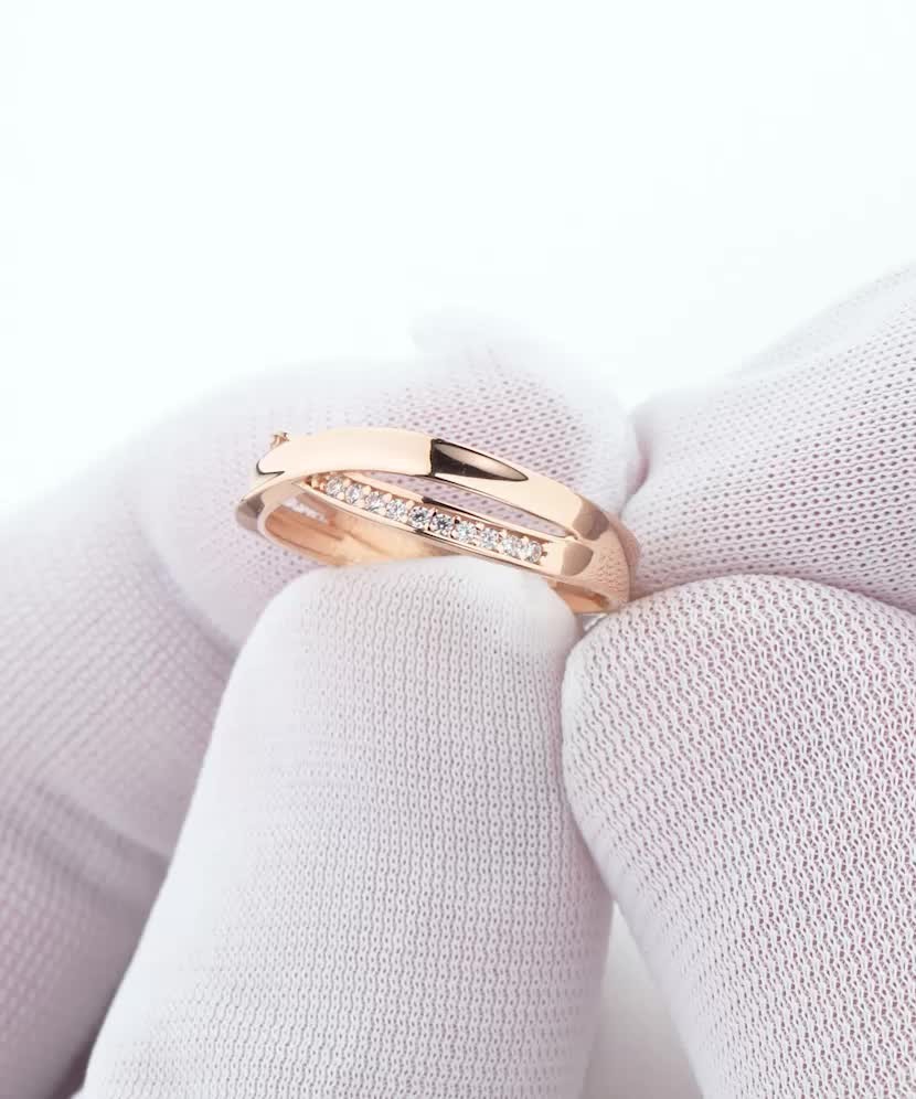 Gold ring with zircons