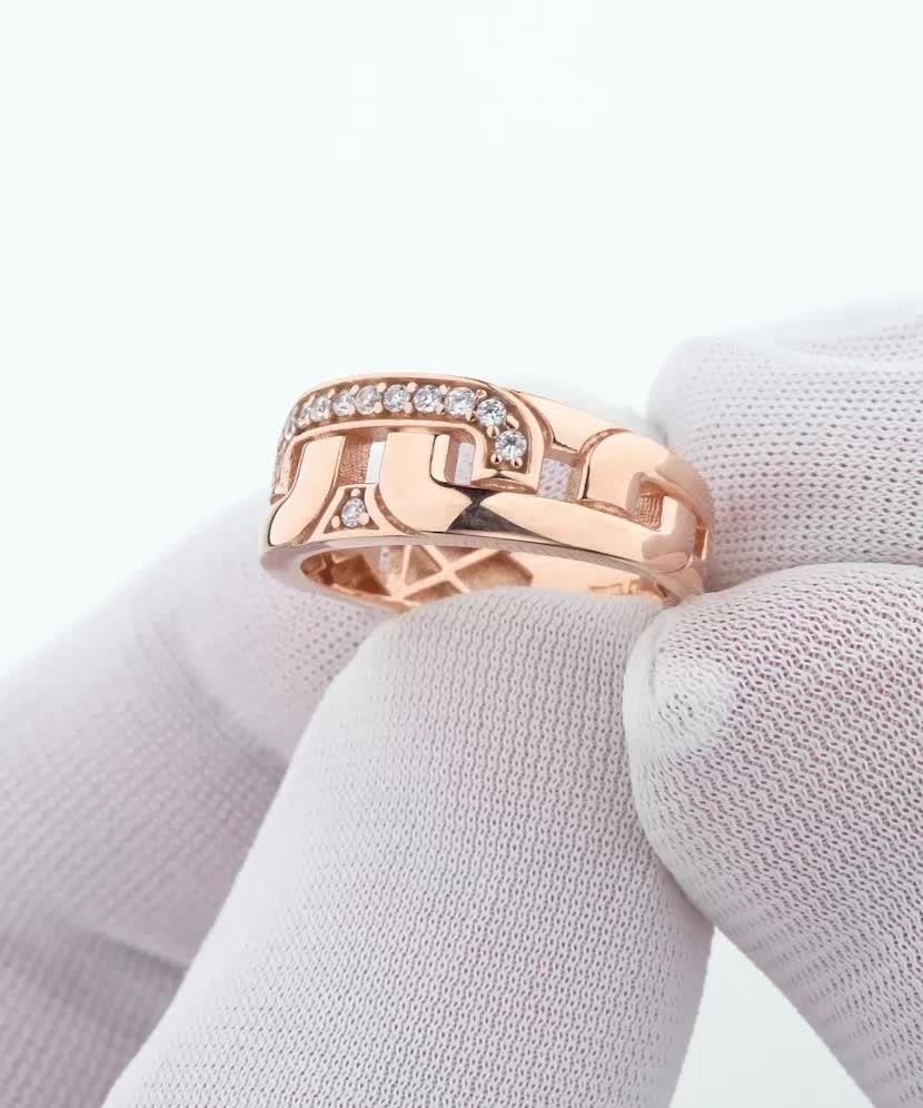 Gold ring with zircons