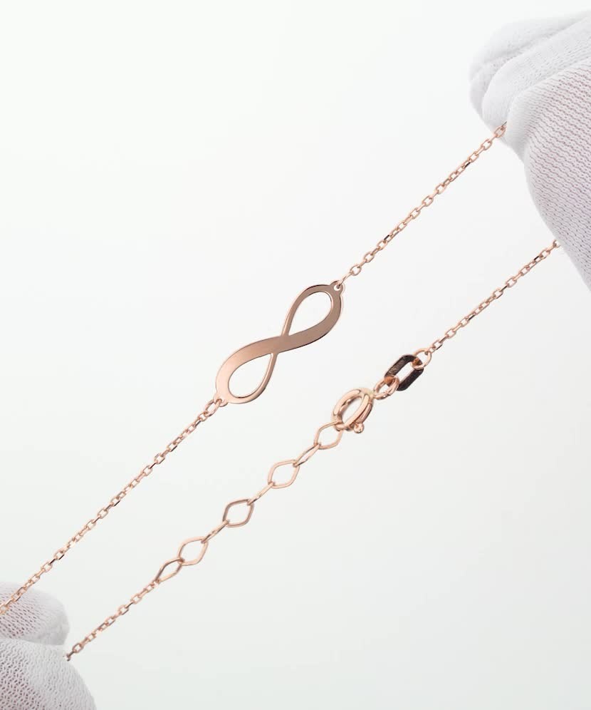 Kultainen rannekoru "ääretön"