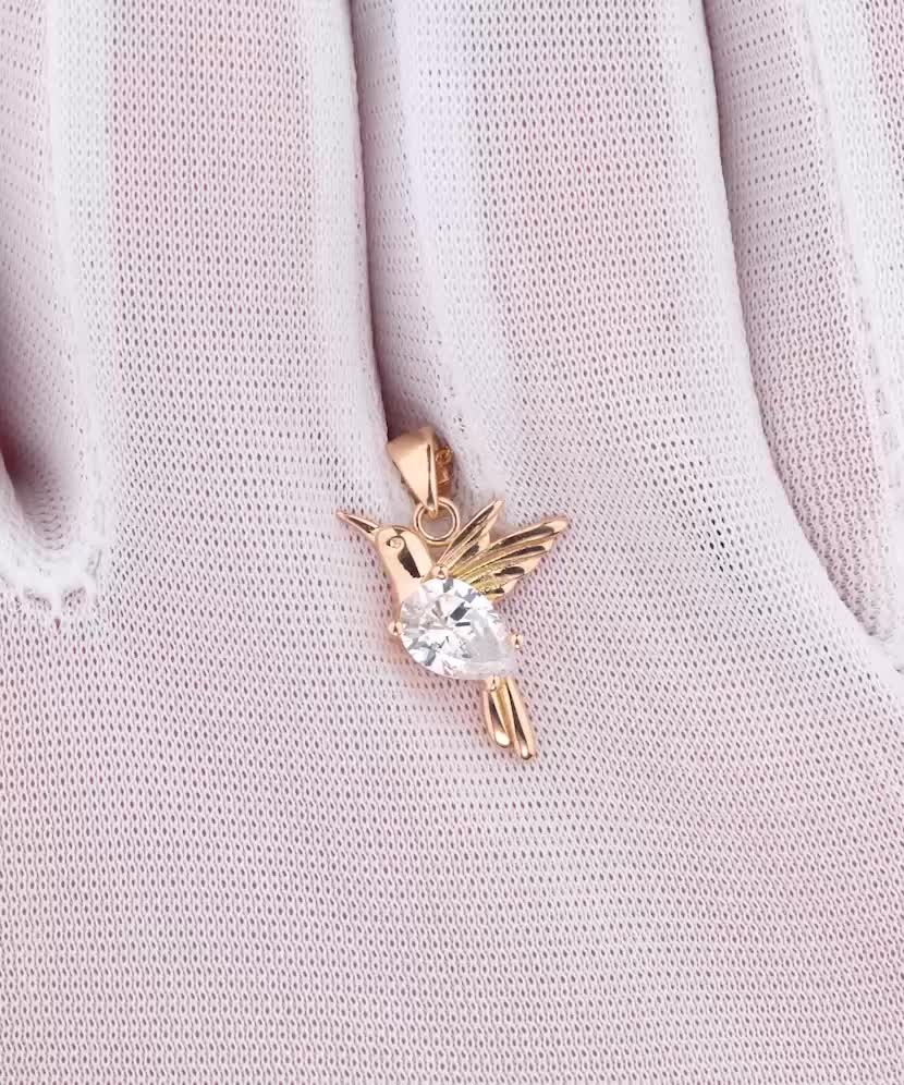 Gold pendant with zirconium "hummingbird"