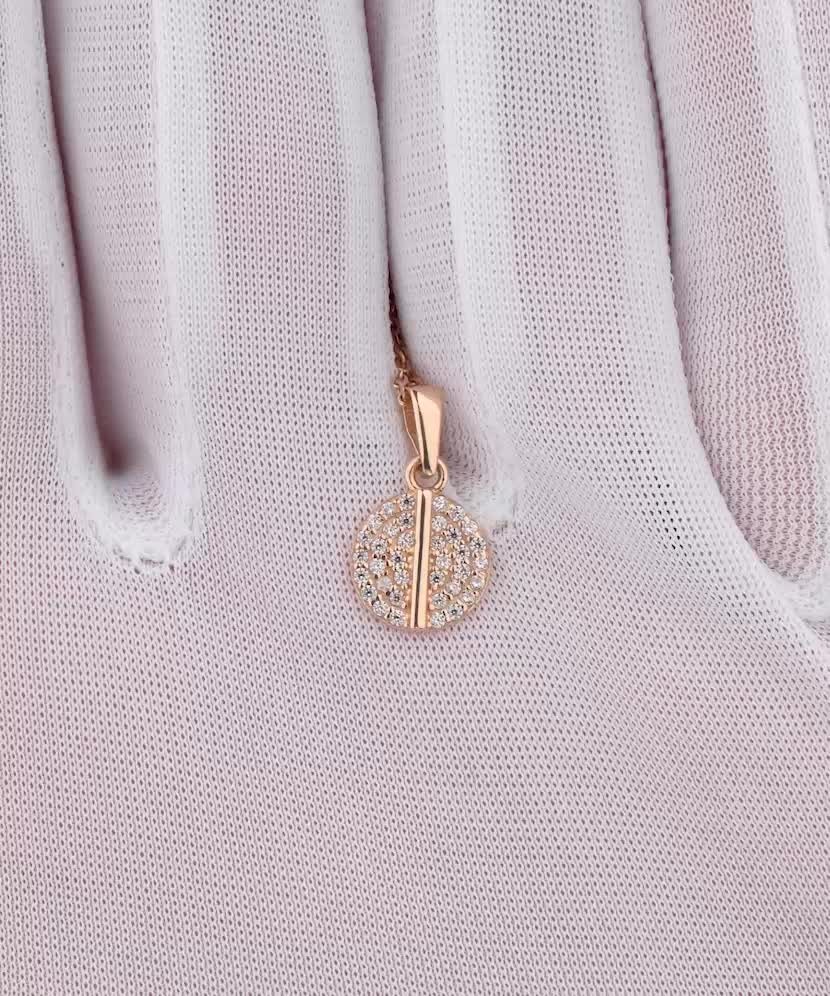 Kultainen riipus zirkoneilla