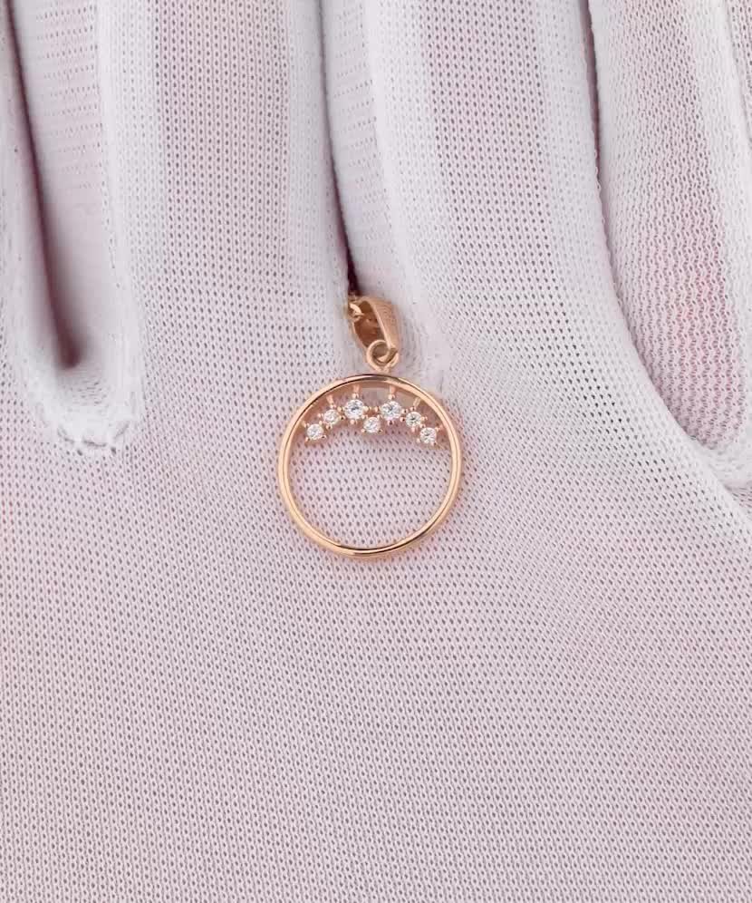 Gold pendant with zircons