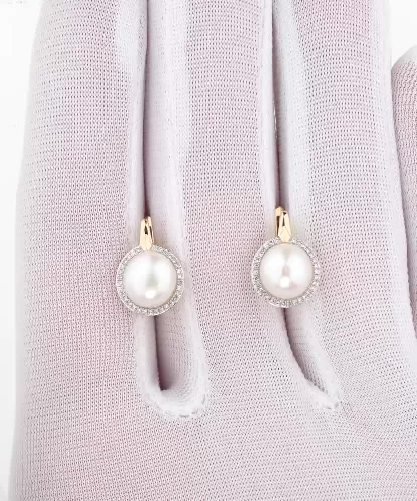 Keltakultaiset korvakorut timanteilla ja helmillä