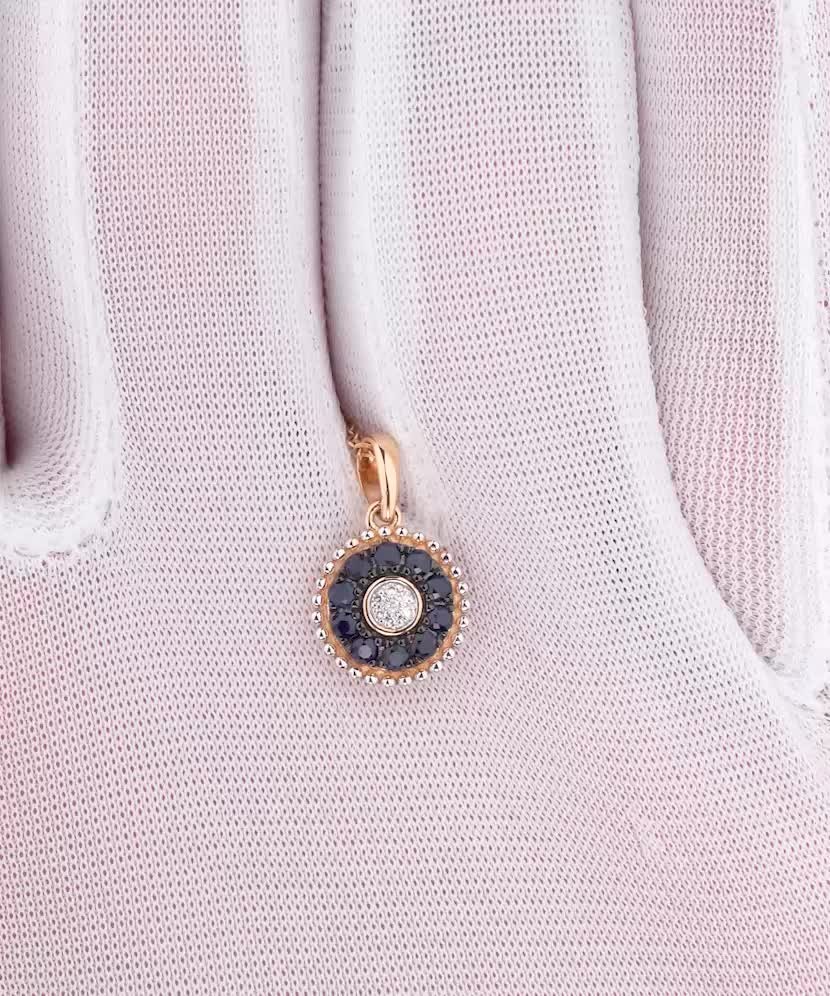 Gold pendant with sapphire and diamonds