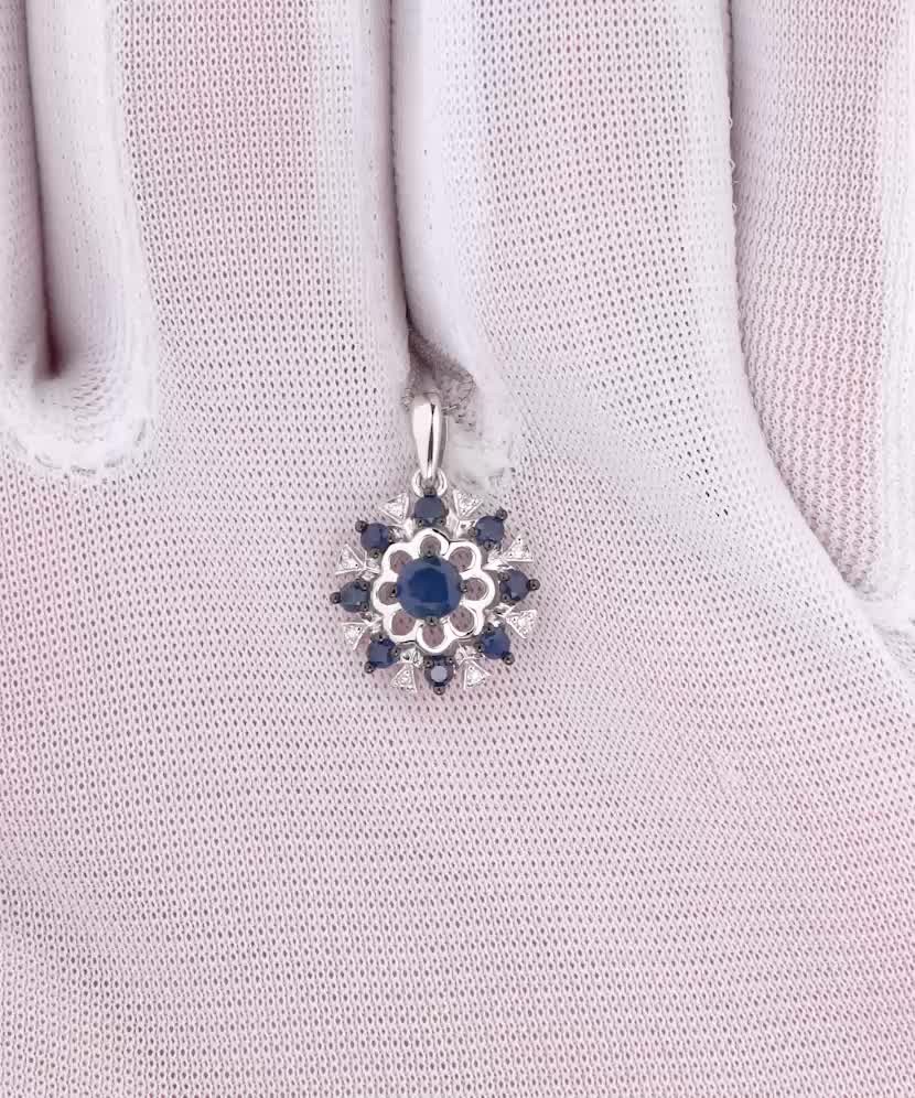 White gold pendant with diamonds and sapphires