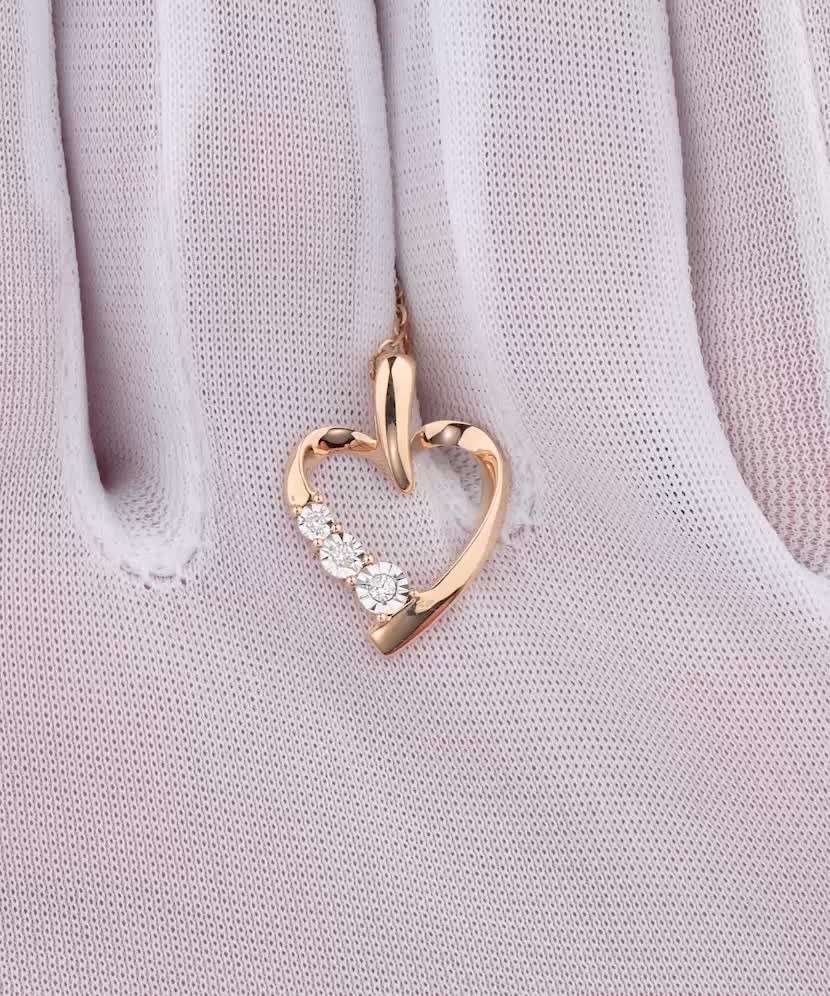 Kultainen riipus timanteilla "sydän"