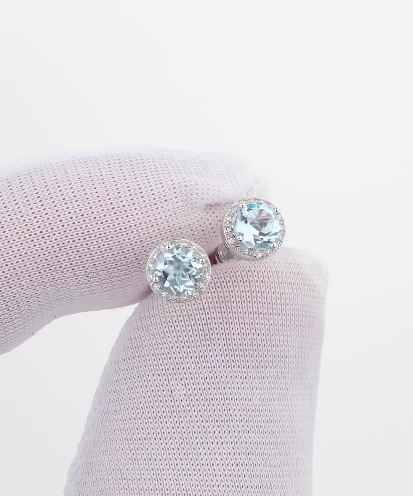 White gold earrings with topazes and diamonds