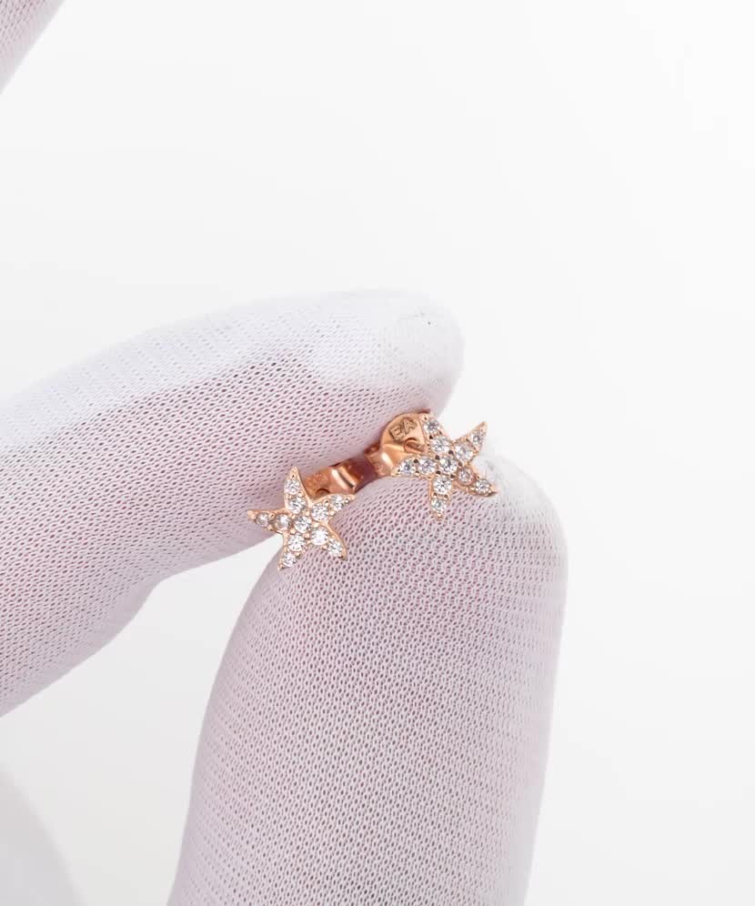 Gold earrings with zircons "star"