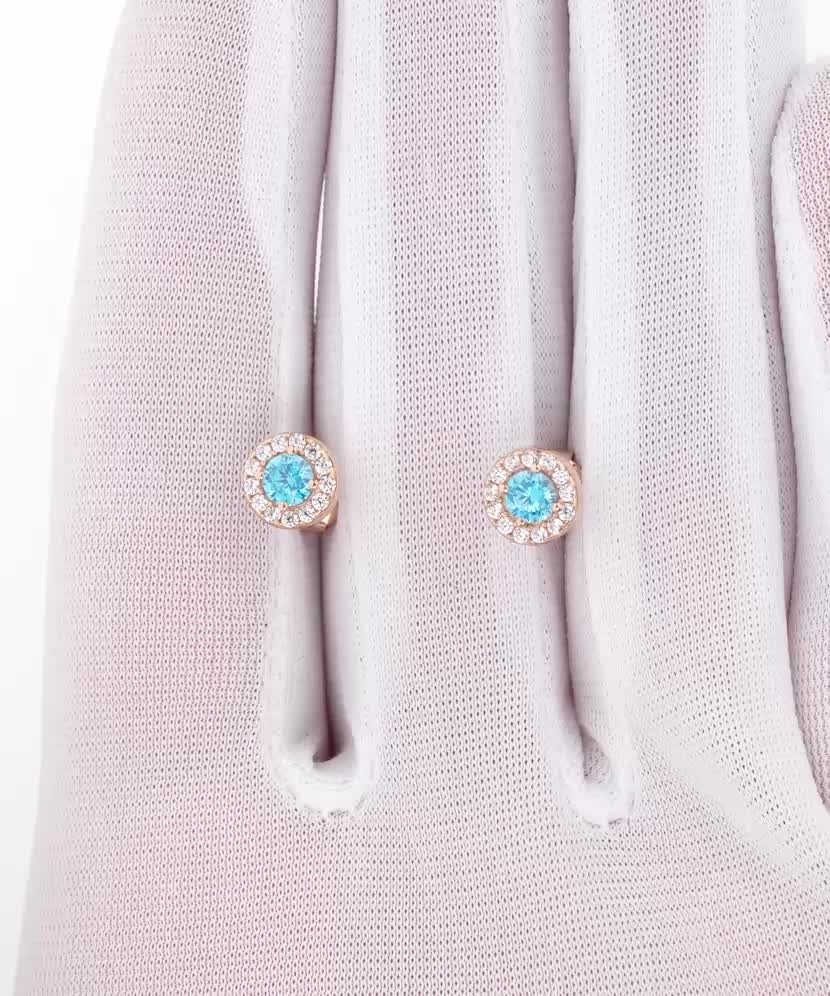 Gold earrings with zircons