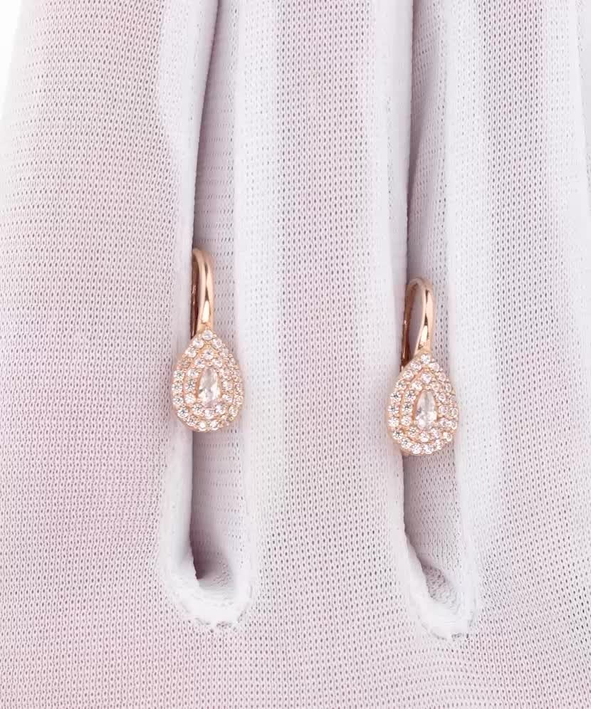 Gold earrings with zircons