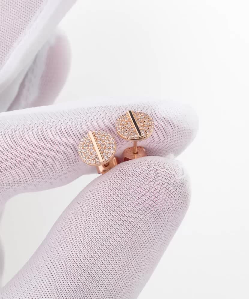 Gold earrings with zircons