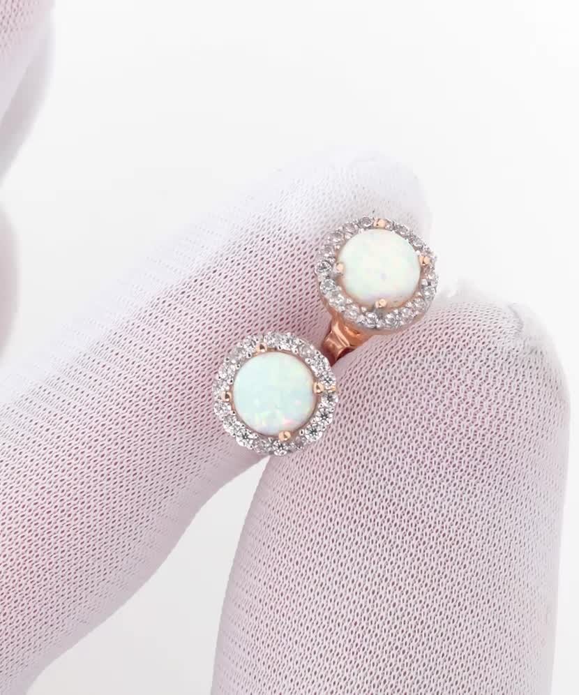 Gold earrings with opal and zircons