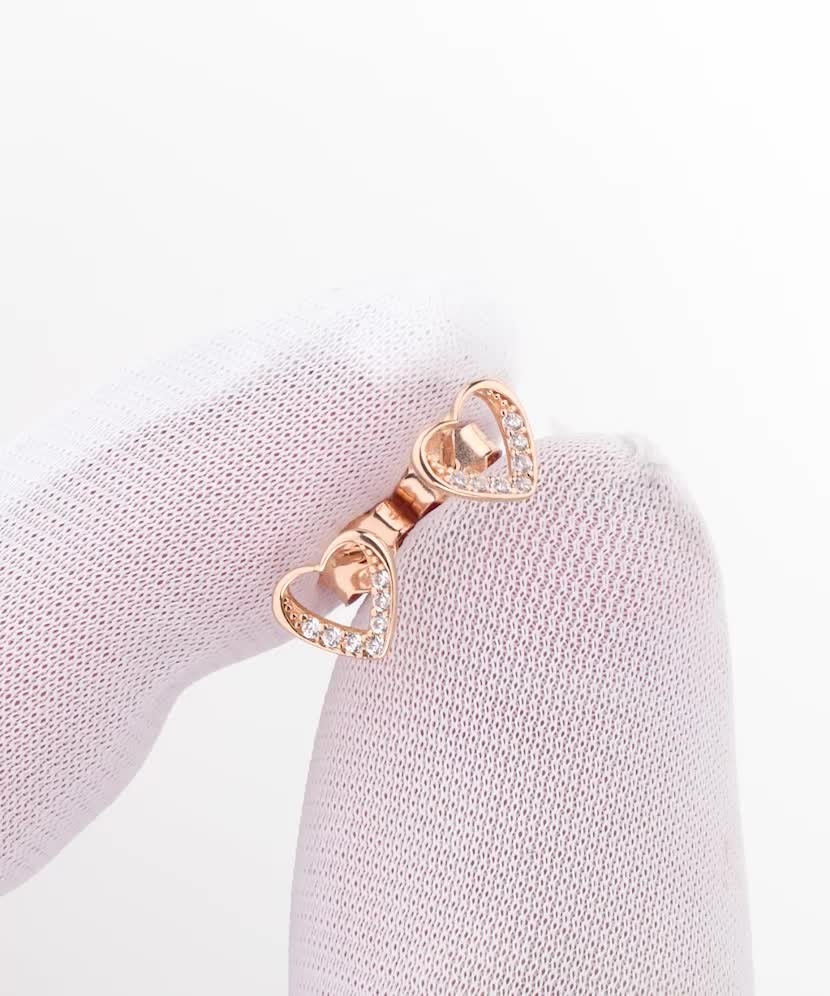 Kultaiset korvakorut zirkoneilla