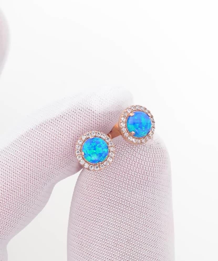 Gold earrings with opal and zircons