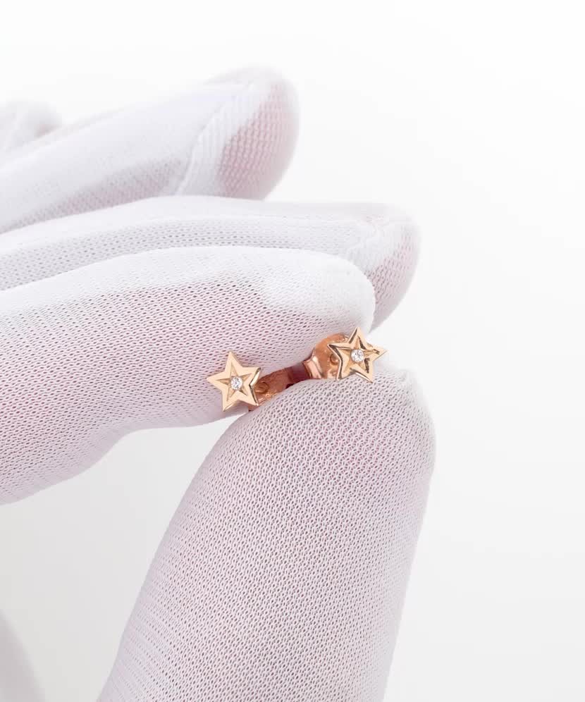 Gold earrings with zircons "star"